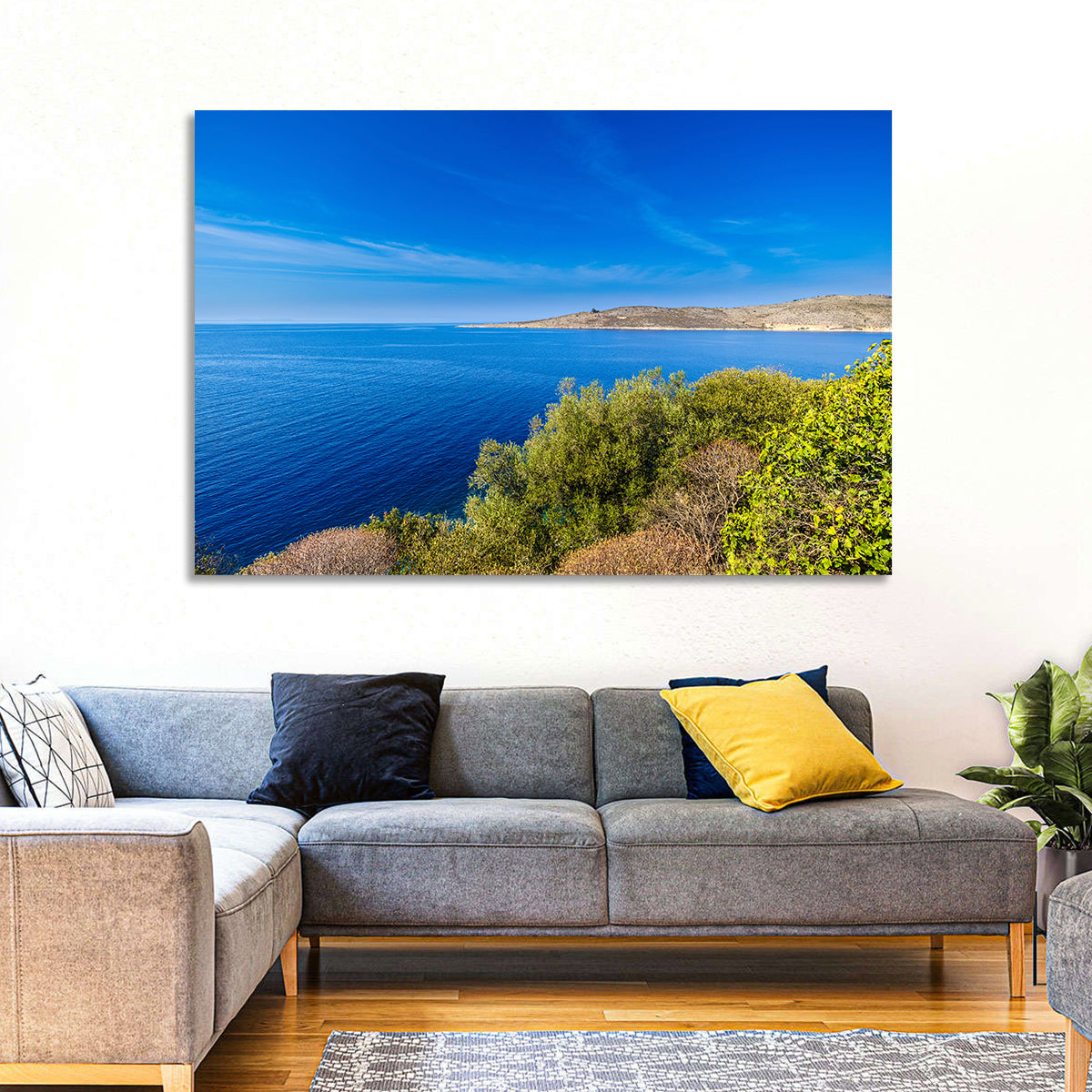 Sunlit Albanian Coastline Wall Art in a room, landscape