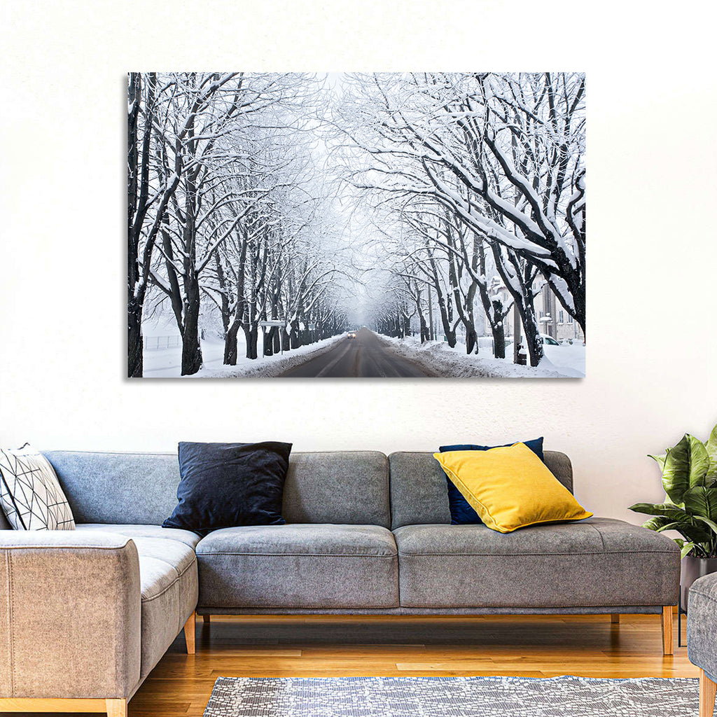 Snowy Road with Distant Headlights Wall Art