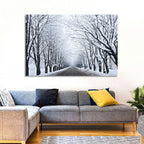 Snowy Road with Distant Headlights Wall Art