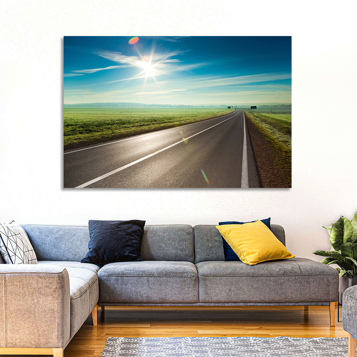 Sunlit Road Through Green Field Wall Art in a room, landscape