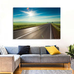 Sunlit Road Through Green Field Wall Art
