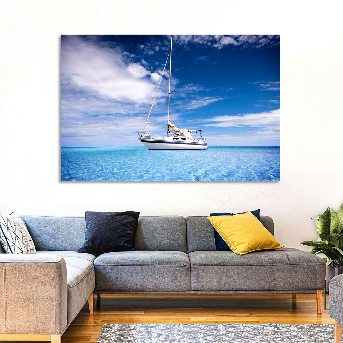 Furled Sails Over Turquoise Water Wall Art in a room, landscape