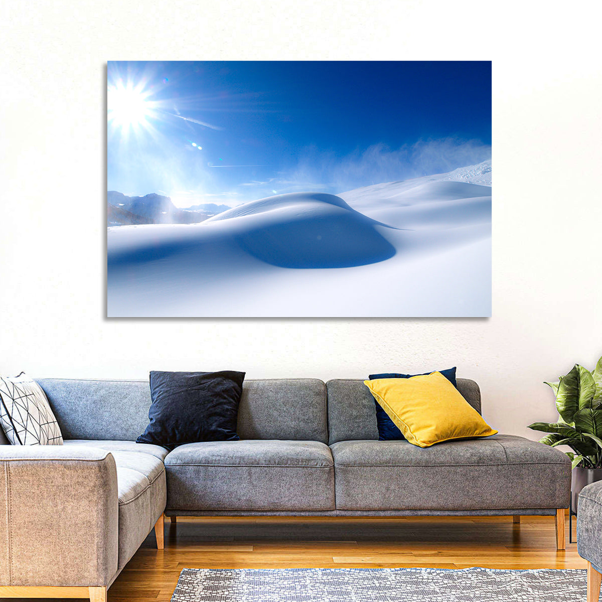 Sunlit Snow Dune Under Blue Sky Wall Art in a room, landscape