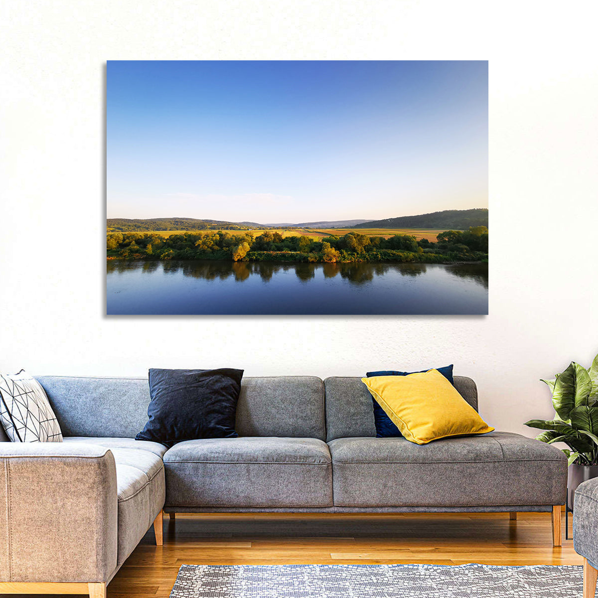 Peaceful River Sunset Wall Art in a room, landscape