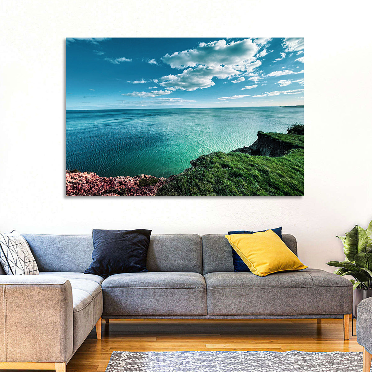Coastal Cliffs Above a Turquoise Sea Wall Art in a room, landscape