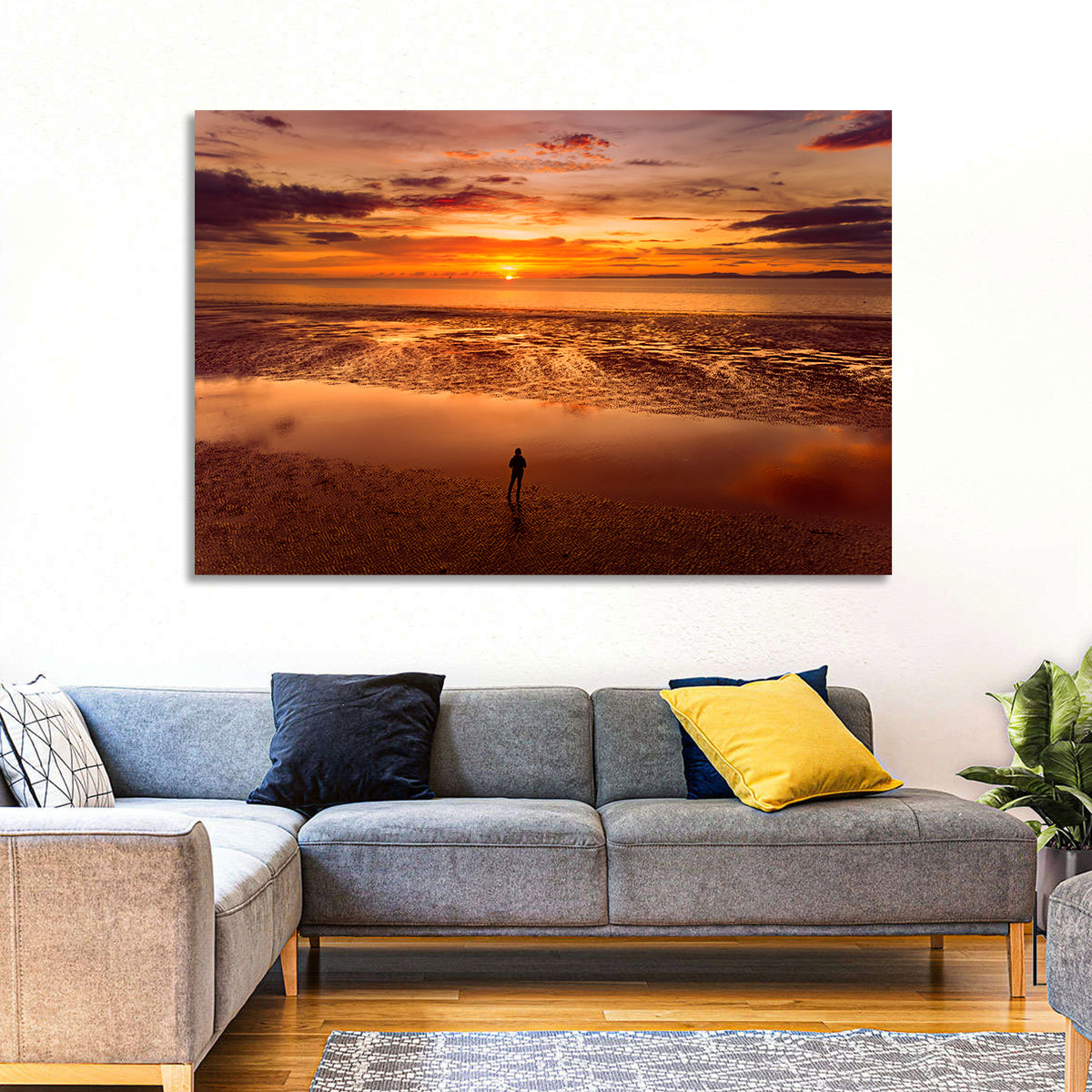 Solitary Figure on Sunset Shore Wall Art in a room, landscape