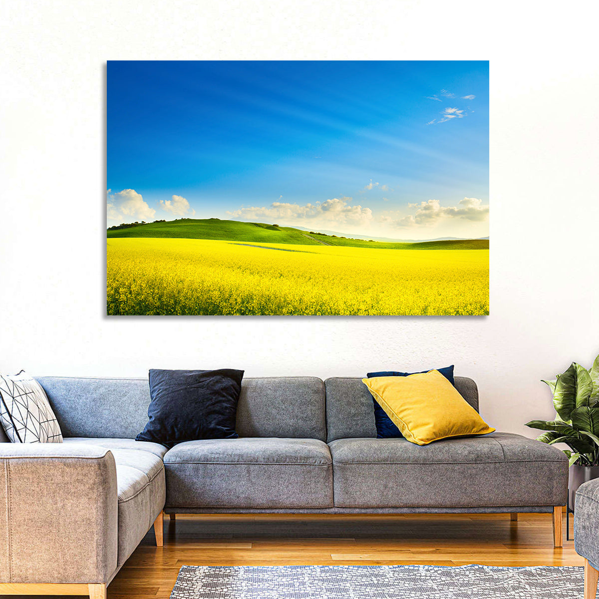 Rapeseed Field and Rolling Hills Under Blue Sky Wall Art