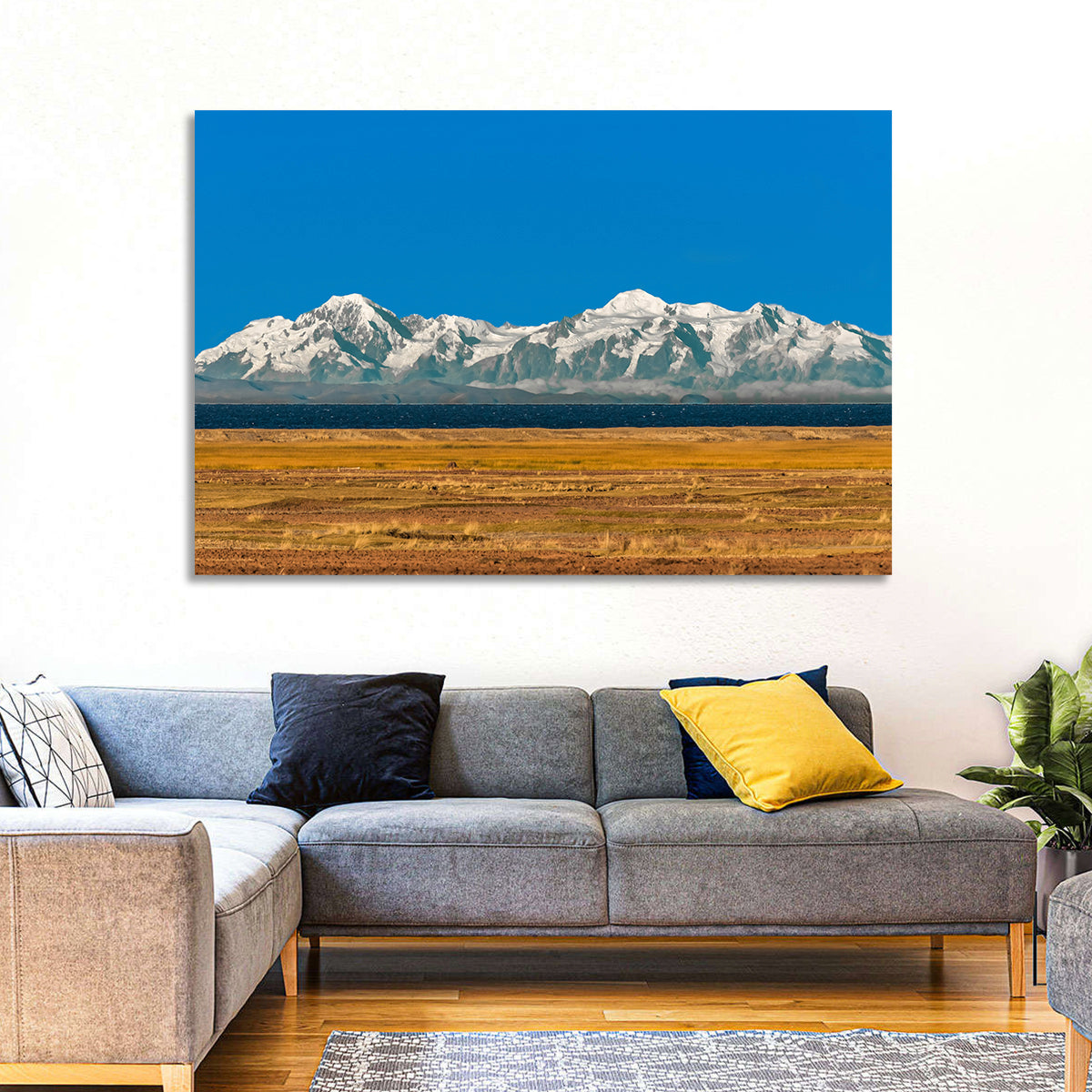 Snow-capped Peaks Over Lake Titicaca Wall Art in a room, landscape