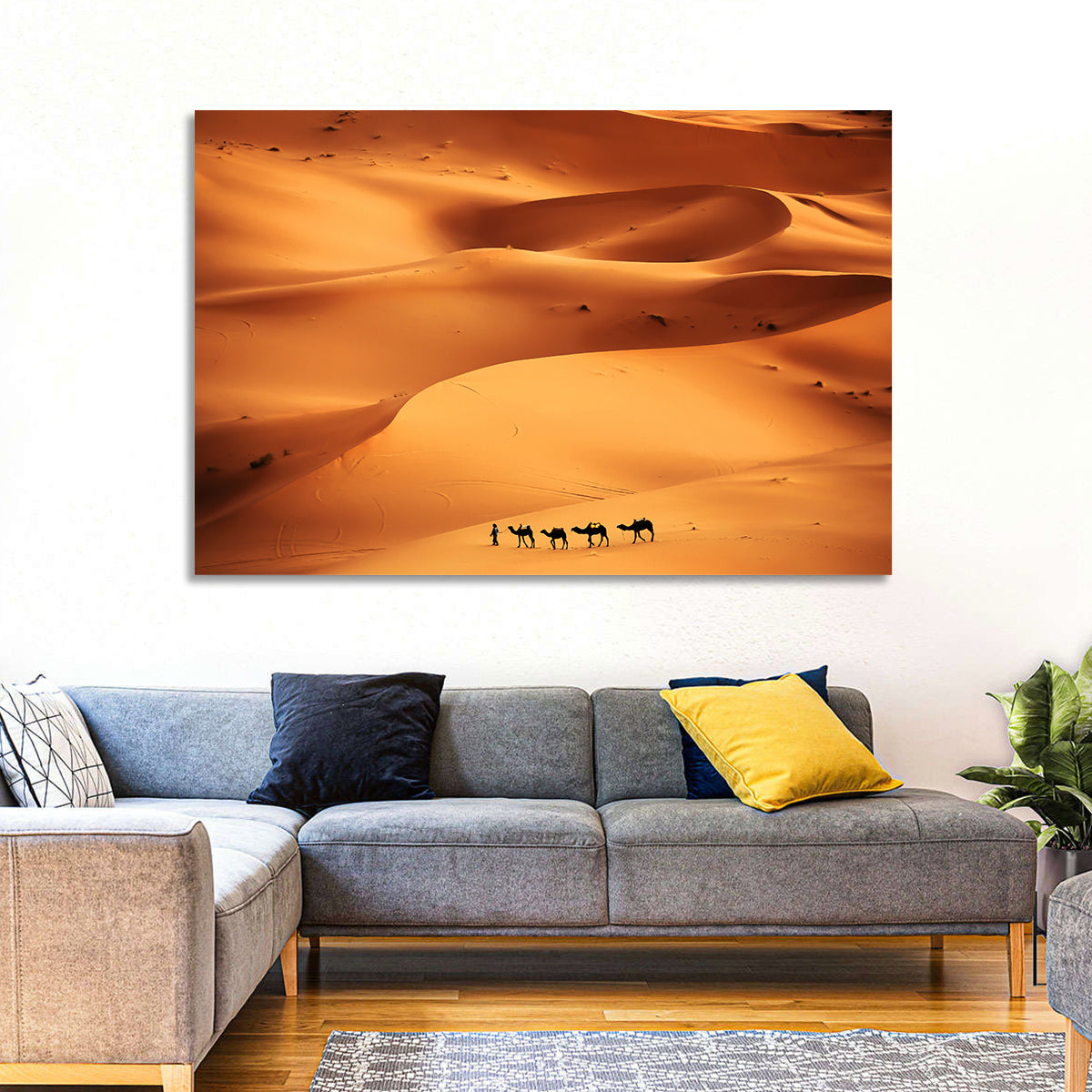 Desert Camel Caravan in Golden Dunes Wall Art in a room, landscape