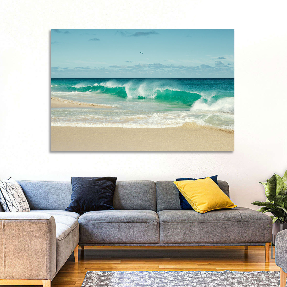 Turquoise Wave on Sandy Beach Wall Art in a room, landscape