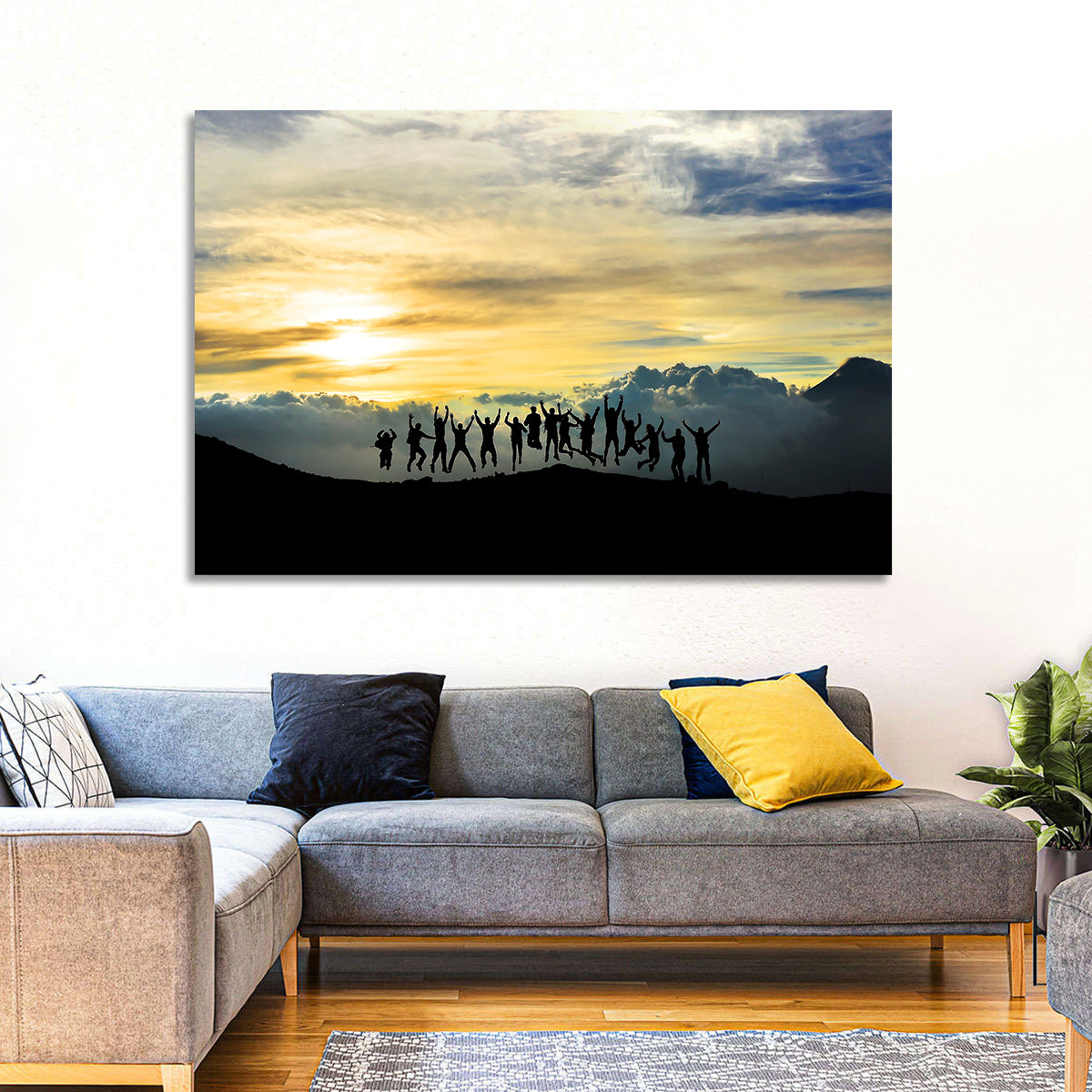 Golden Team Silhouettes at Sunset Wall Art in a room, landscape