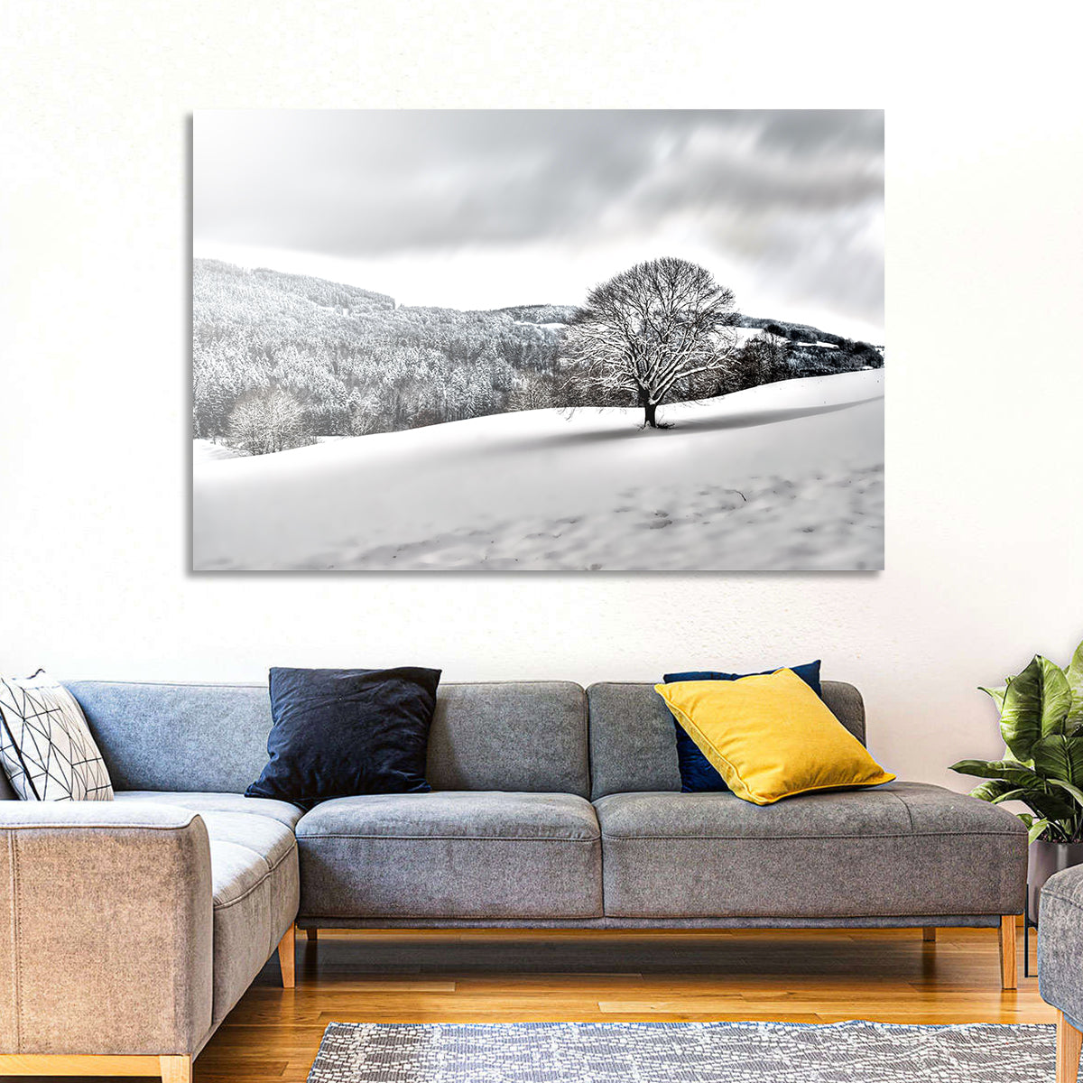 Solitary Snowy Tree Landscape Wall Art in a room, landscape