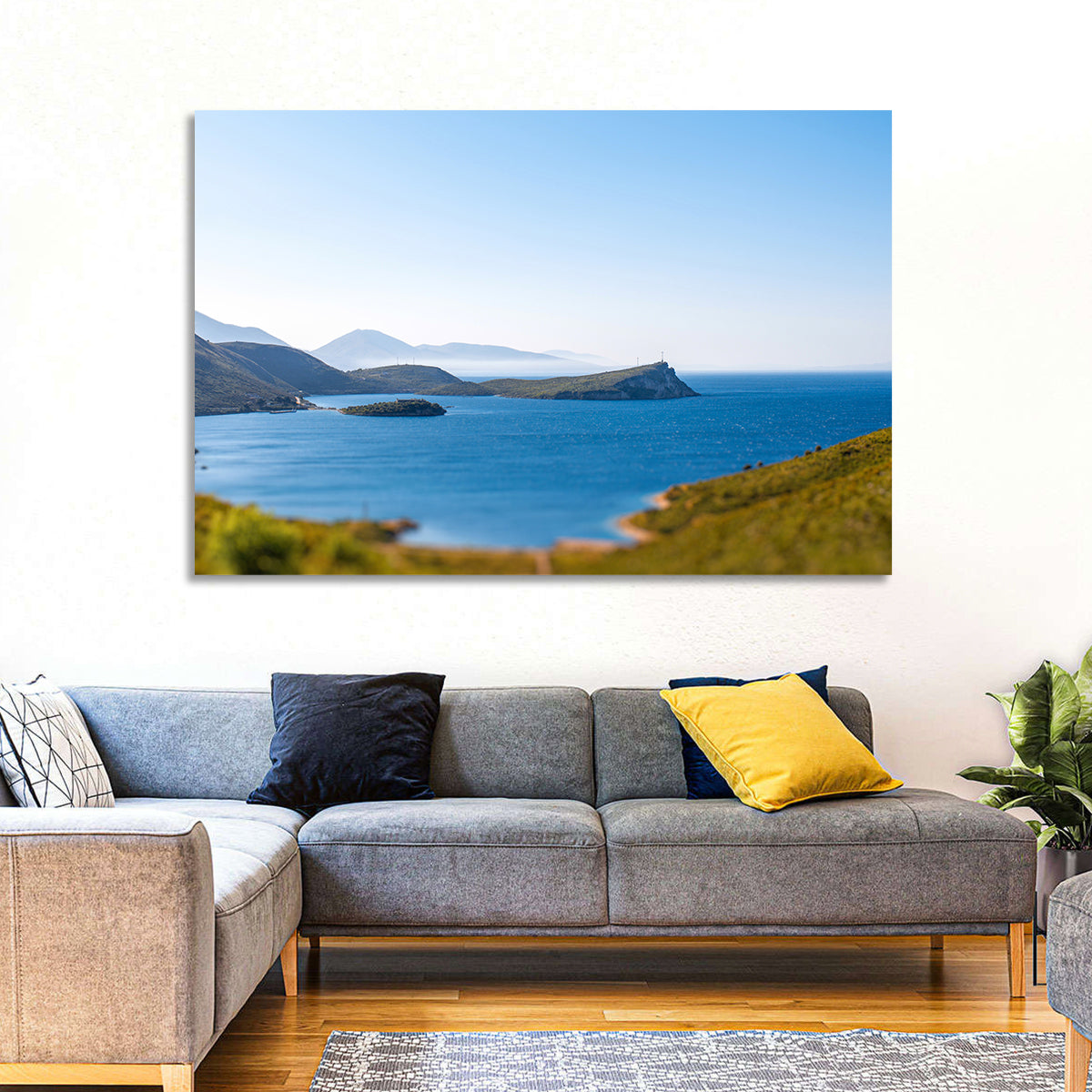 Coastal Cliffs and Lighthouse Bay Wall Art in a room, landscape