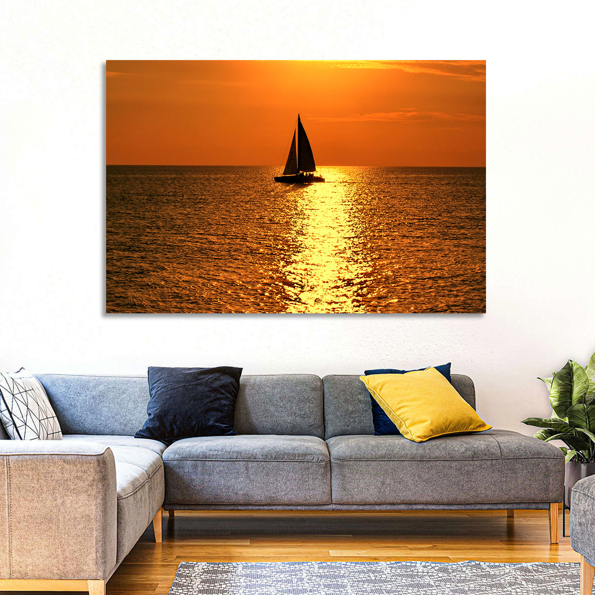 Sailboat Silhouette at Golden Sunset Wall Art in a room, landscape