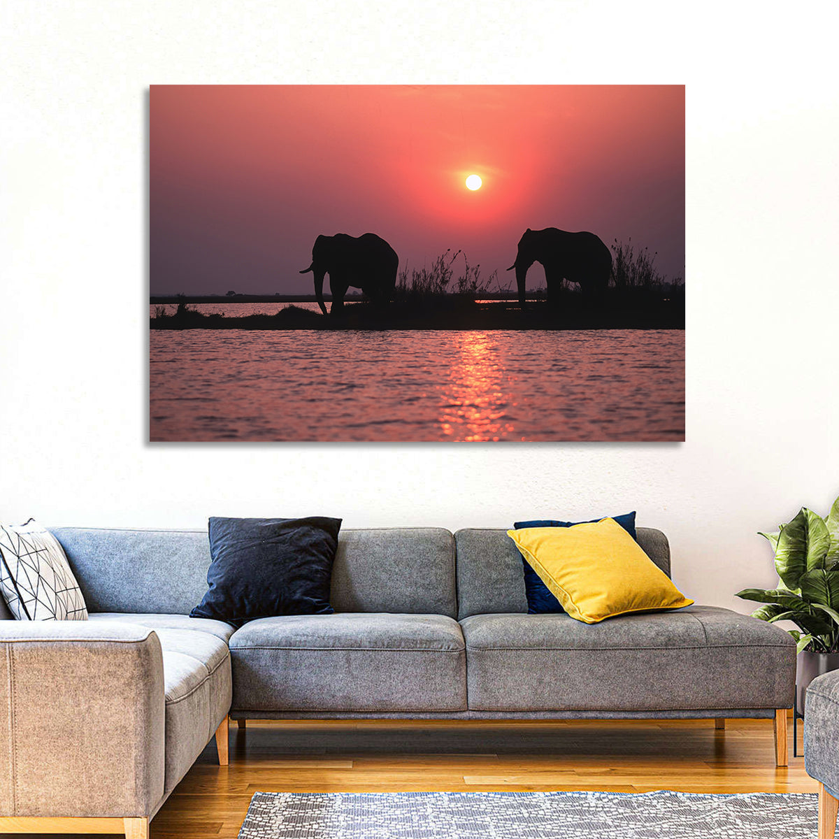 Elephants at Sunset Silhouette Wall Art in a room, landscape
