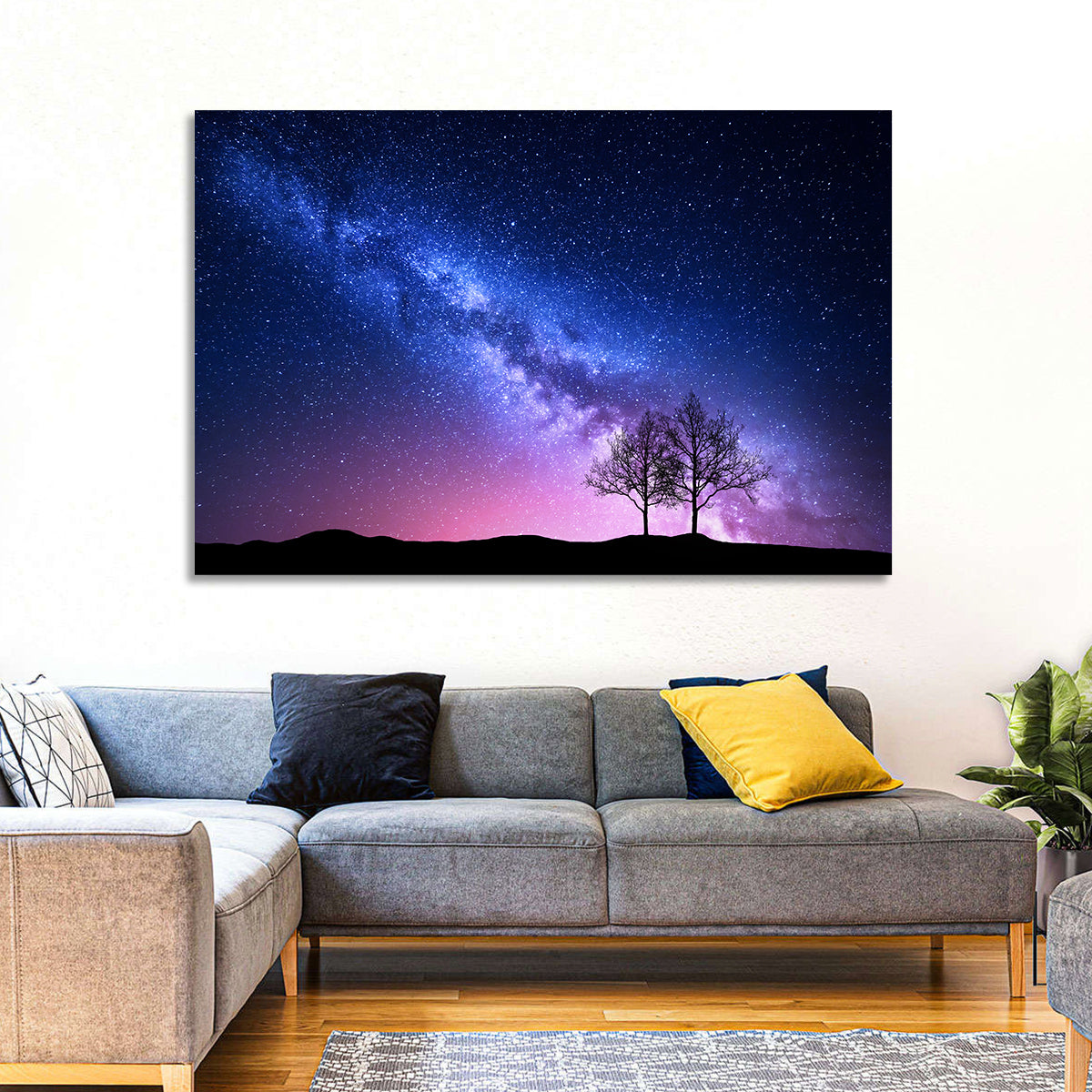 Milky Way Nebula Sky with Silhouetted Trees Wall Art in a room, landscape