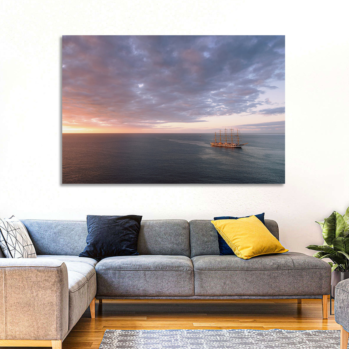 Sunlit Tall Ship at Sea Wall Art in a room, landscape