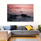 Pink Dusk Lakeshore with Silhouetted Rocks Wall Art