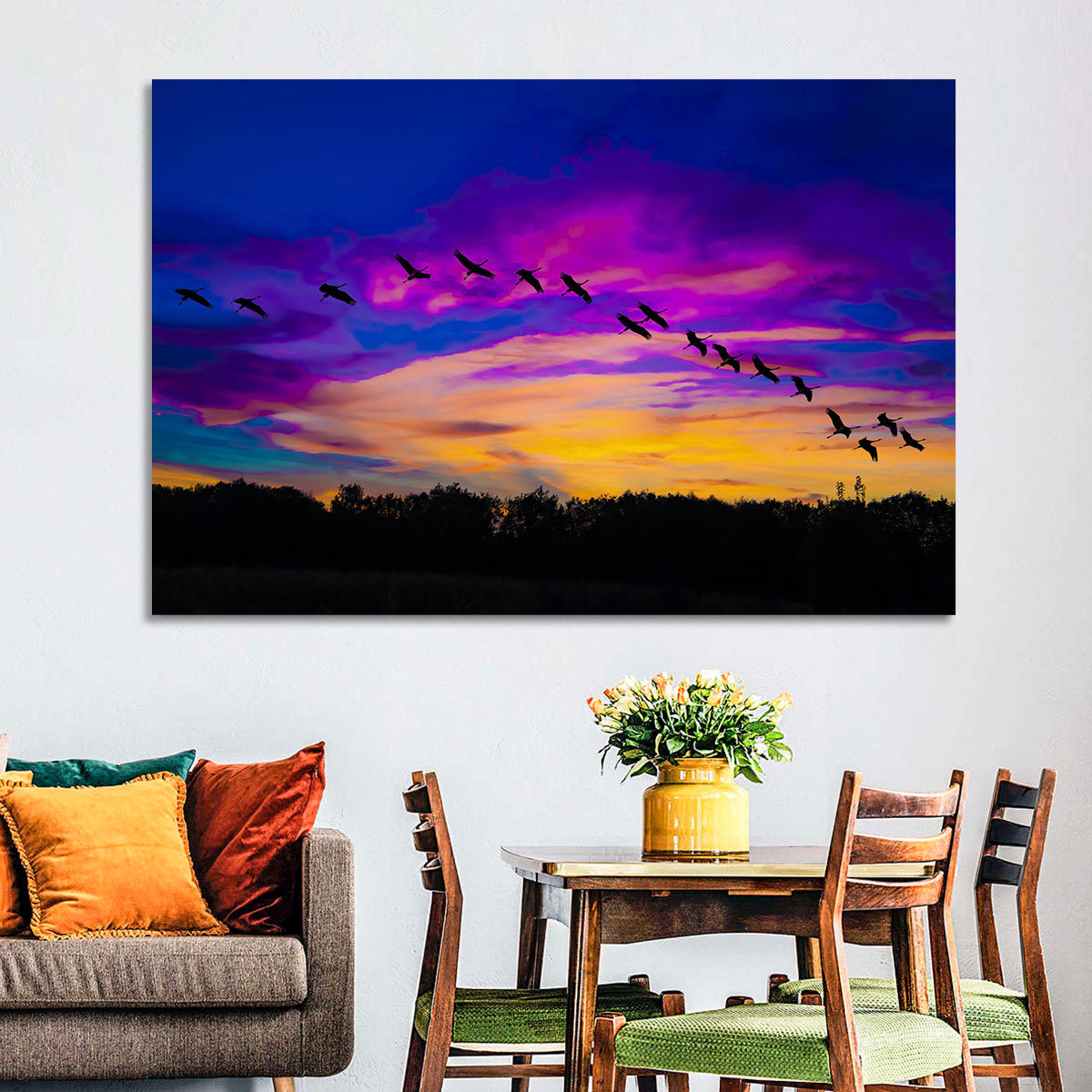 Silhouetted Cranes at Dusk Wall Art in a room, landscape