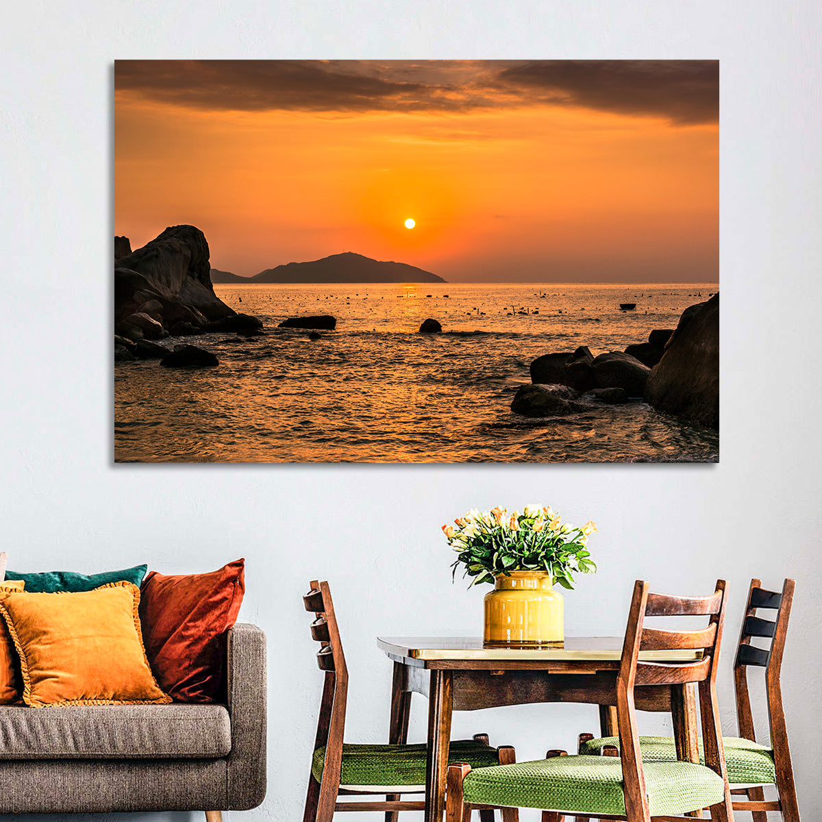 Orange Sunrise Over Rocky Coast Wall Art in a room, landscape