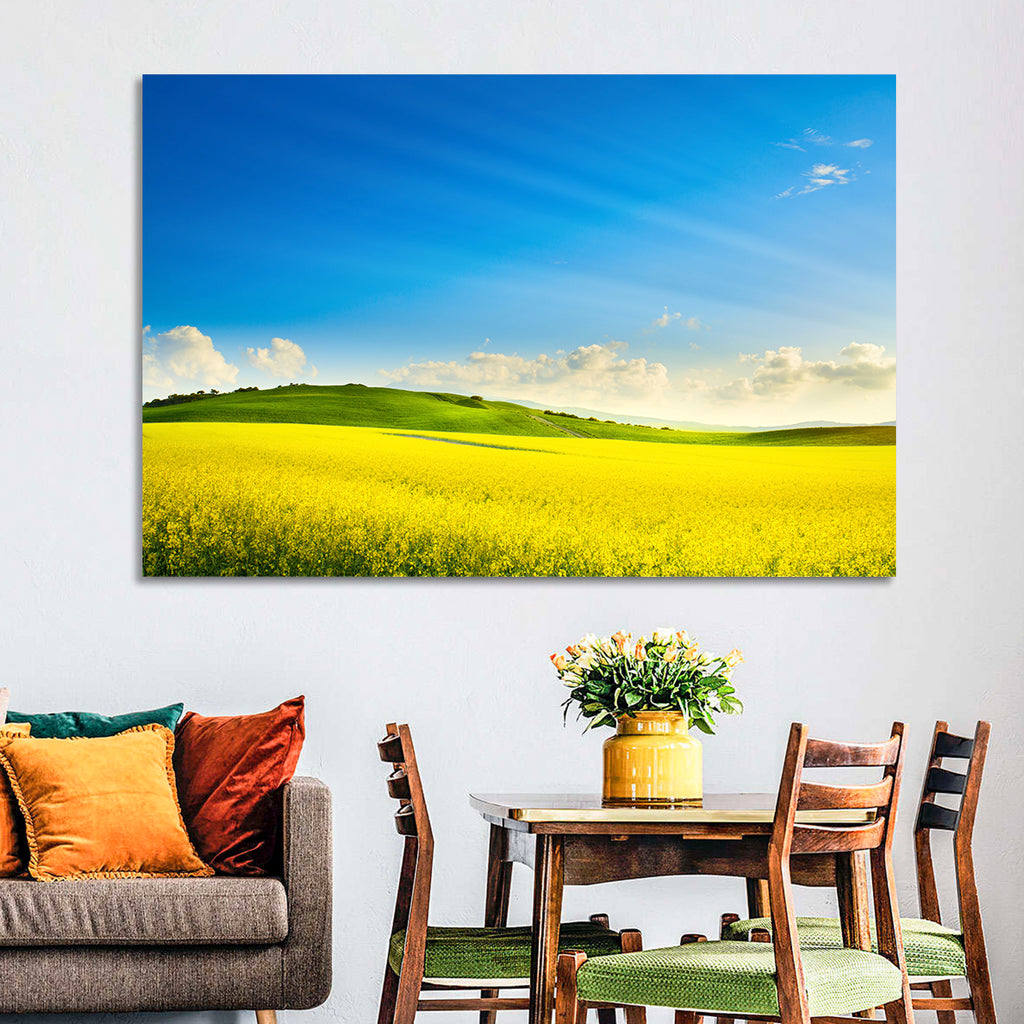 Rapeseed Field and Rolling Hills Under Blue Sky Wall Art