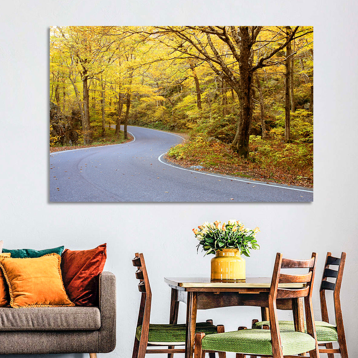 Winding Road Through Autumn Foliage Wall Art in a room, landscape