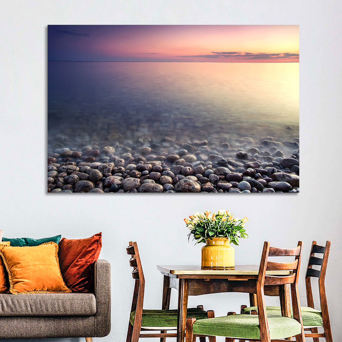 Pebbled Shore Sunset Wall Art in a room, landscape