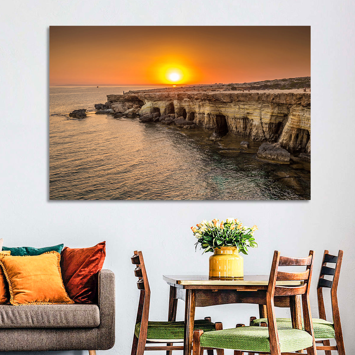 Sunset Over Sea Caves Wall Art in a room, landscape