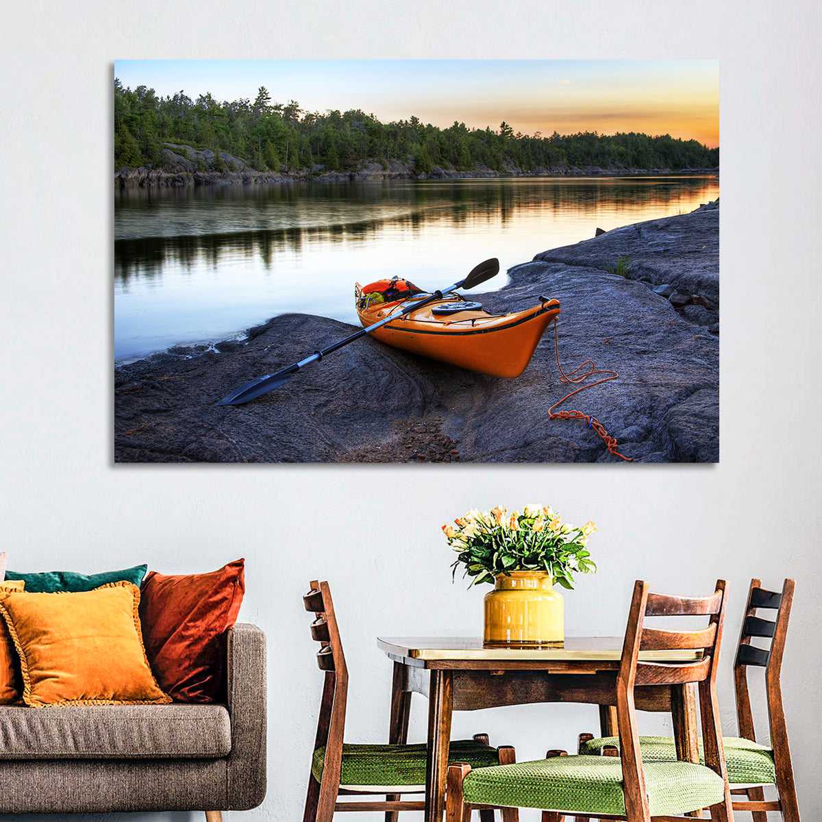 Orange Kayak on Rocky Shore Wall Art in a room, landscape