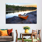 Orange Kayak on Rocky Shore Wall Art