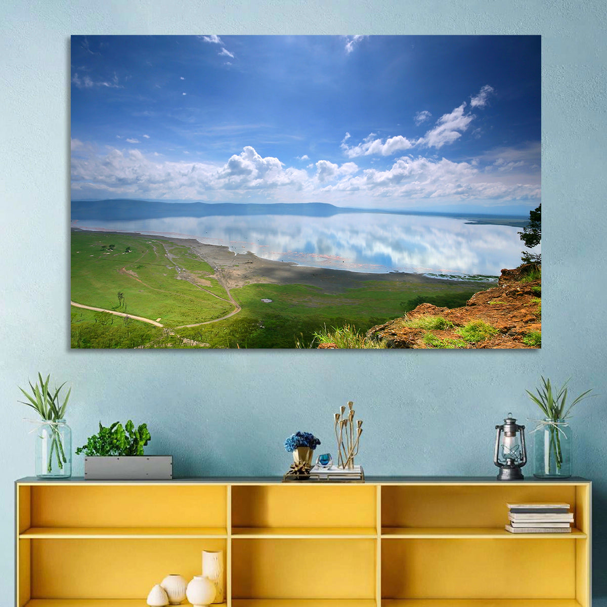 Lake Nakuru Cliffside Reflection Wall Art in a room, landscape