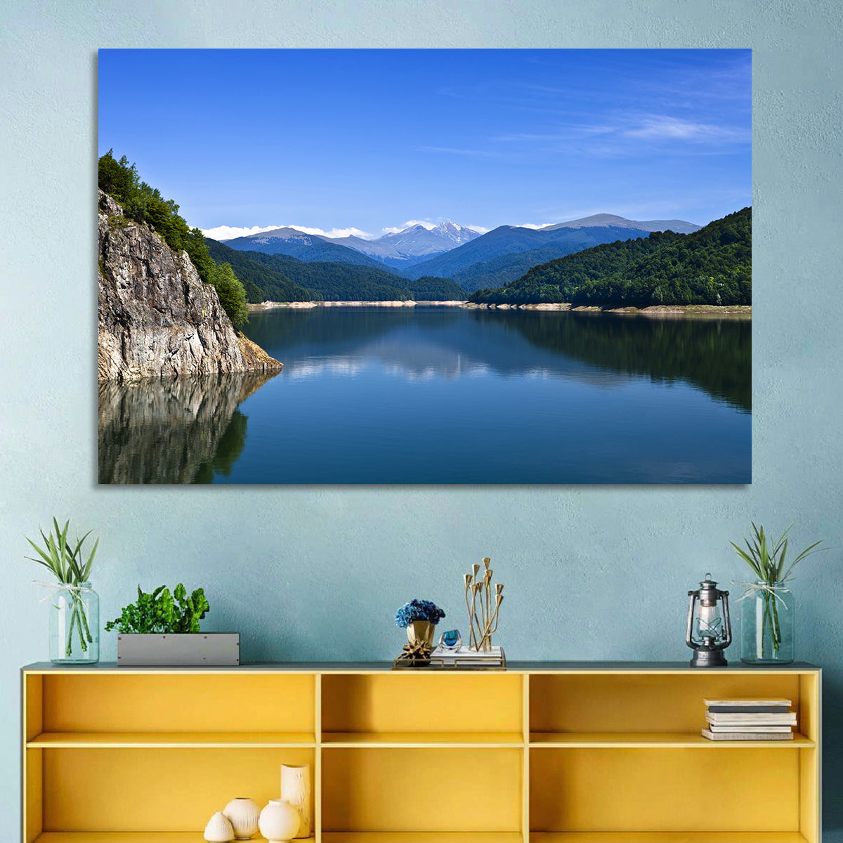 Cliffside Mountain Lake Reflection Wall Art in a room, landscape