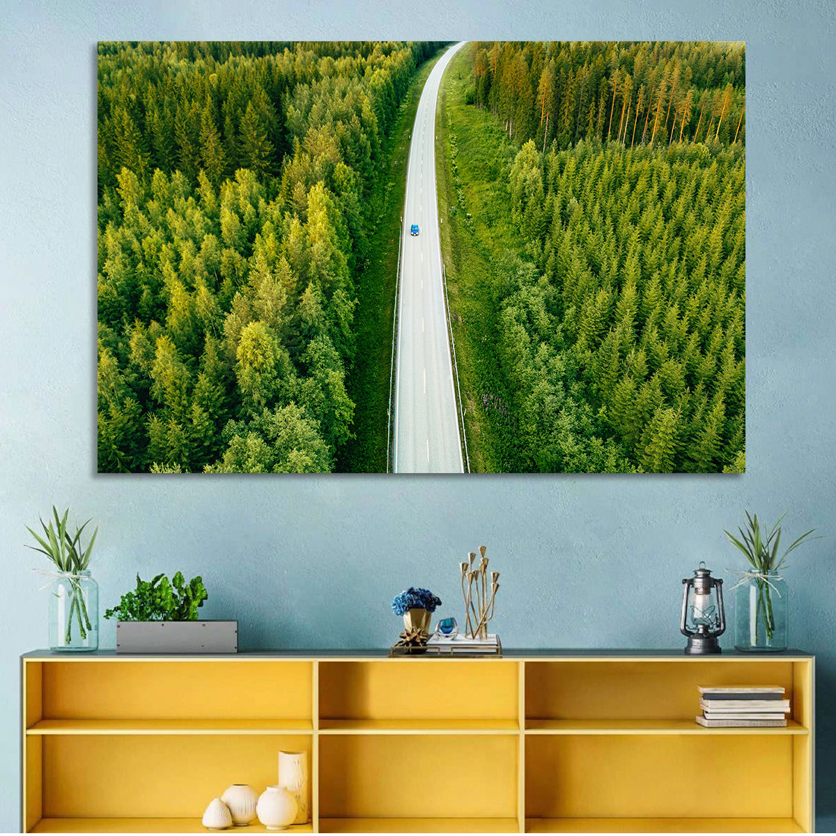 Blue Car on Forest Road Wall Art in a room, landscape