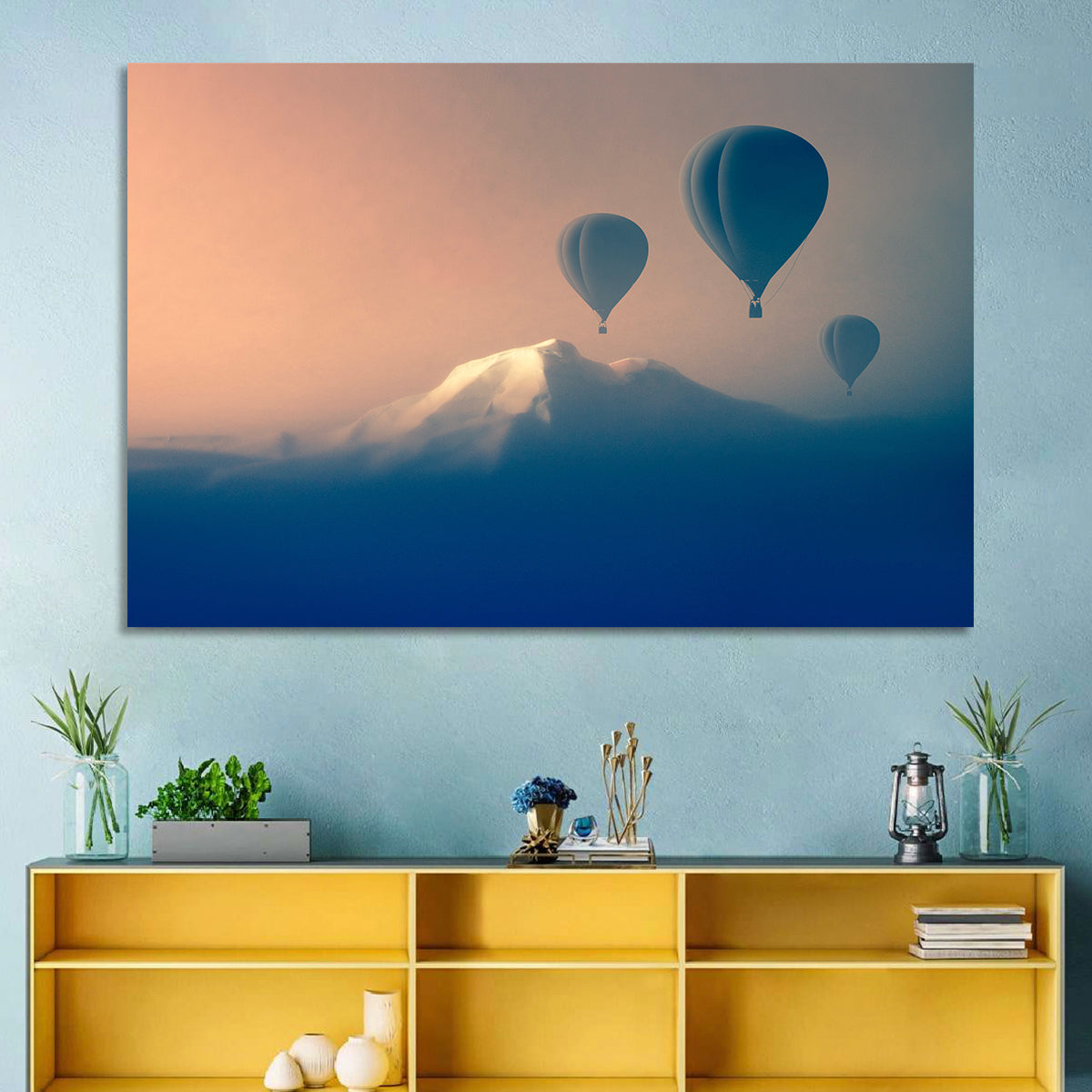 Three Hot Air Balloons Over Misty Peak Wall Art in a room, landscape