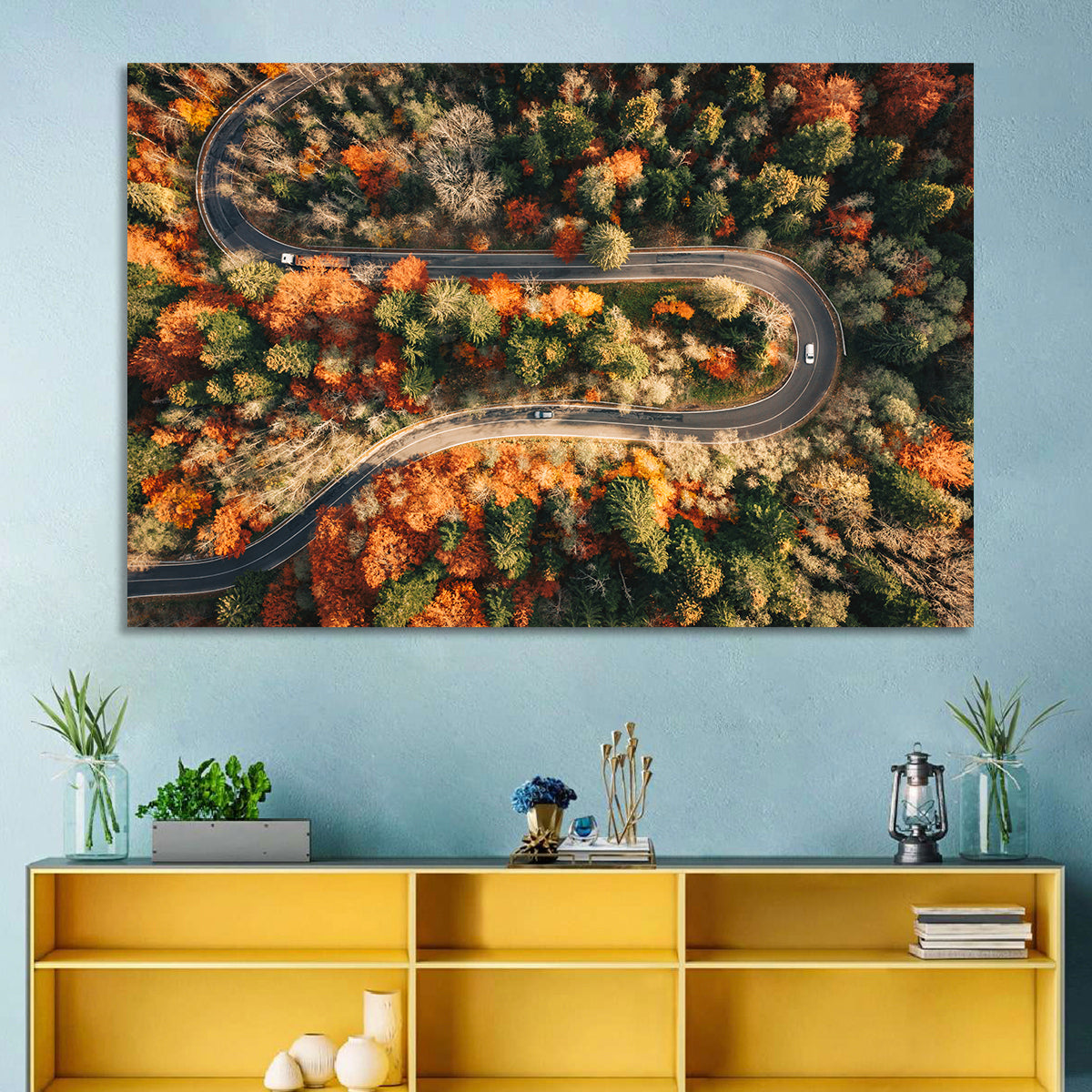 Aerial Winding Autumn Forest Road Wall Art in a room, landscape