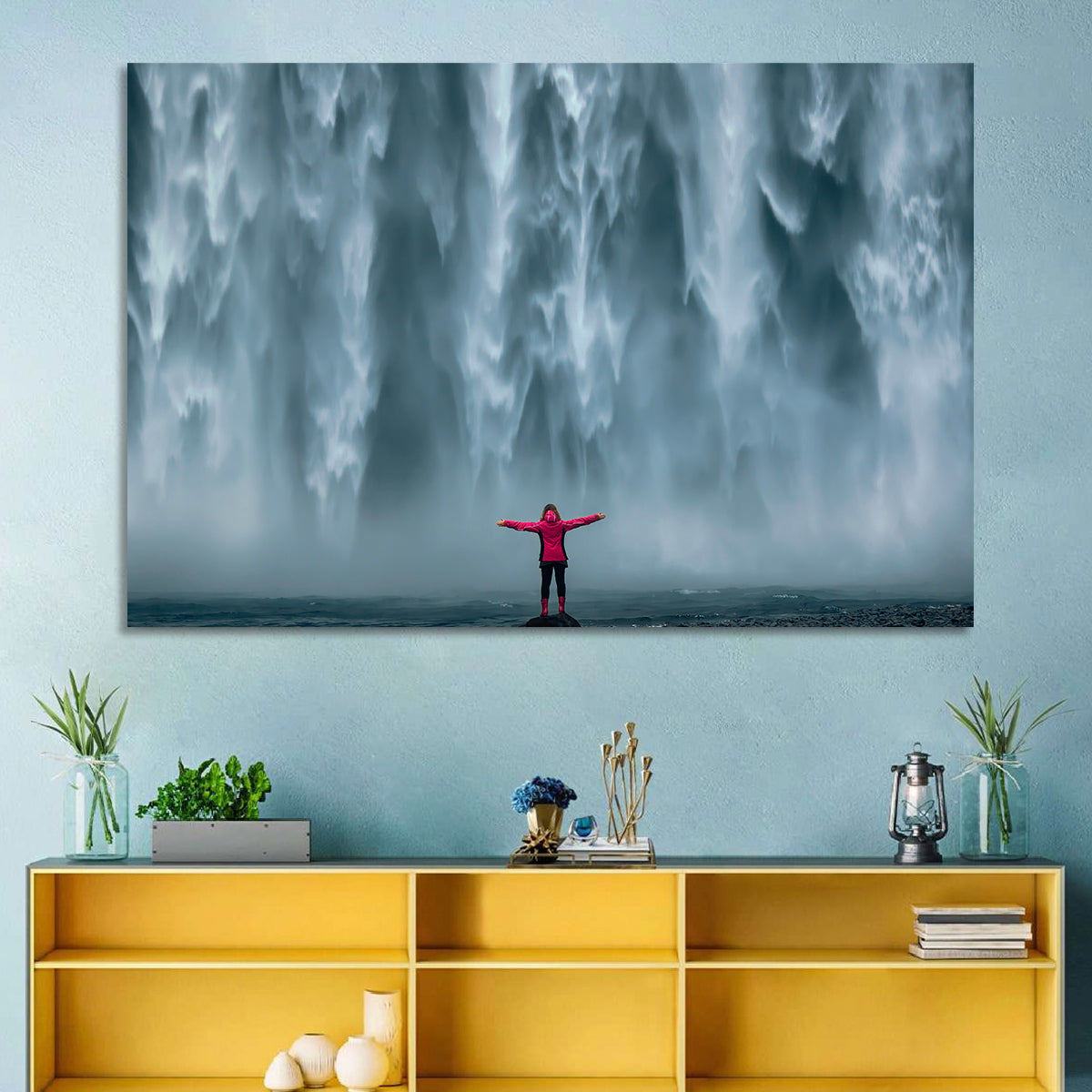 Skogafoss Waterfall with Figure in Pink Wall Art in a room, landscape