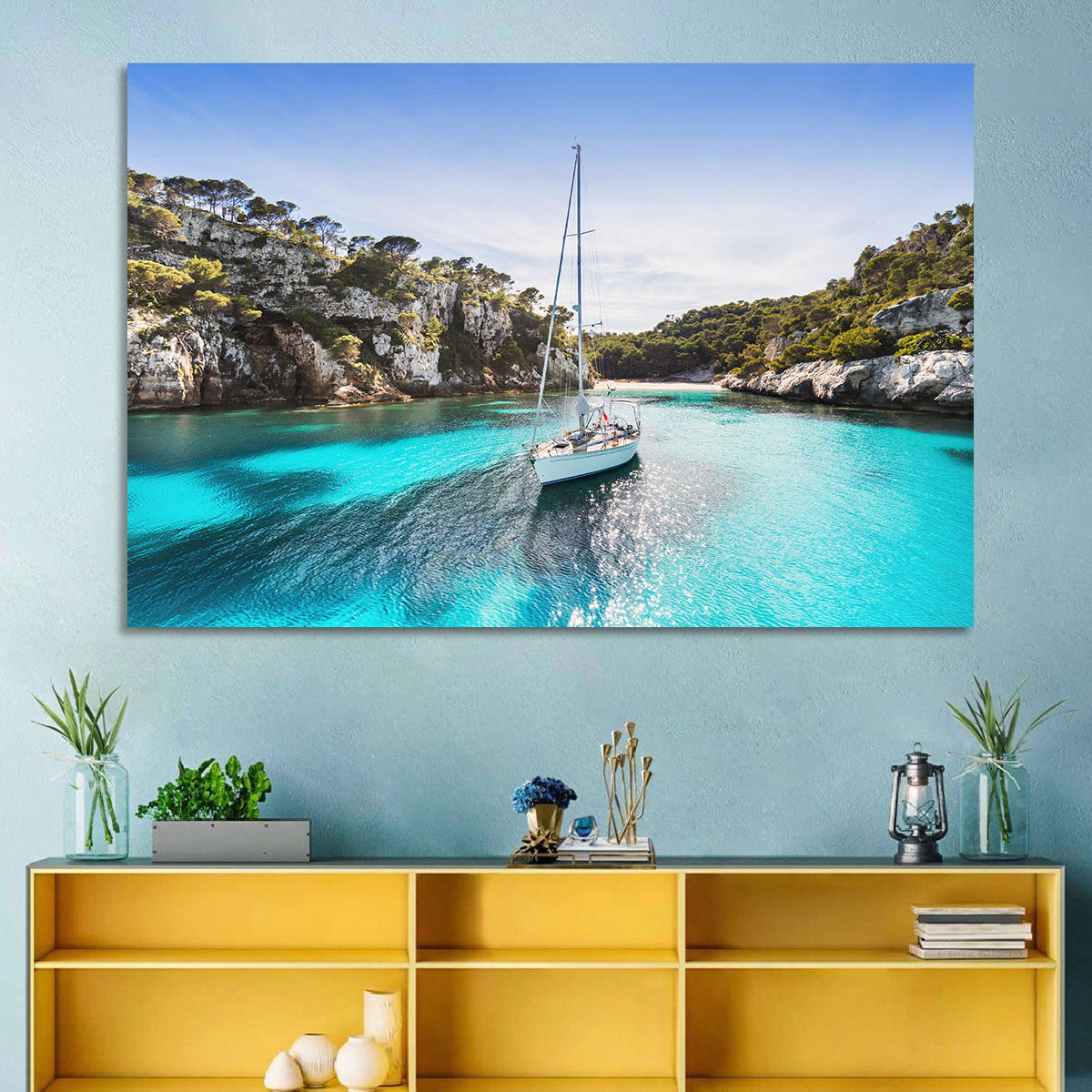 Menorca Cove Sailboat Wall Art in a room, landscape