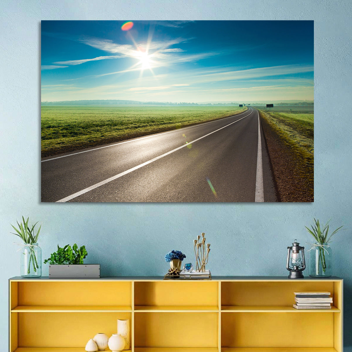 Sunlit Road Through Green Field Wall Art in a room, landscape