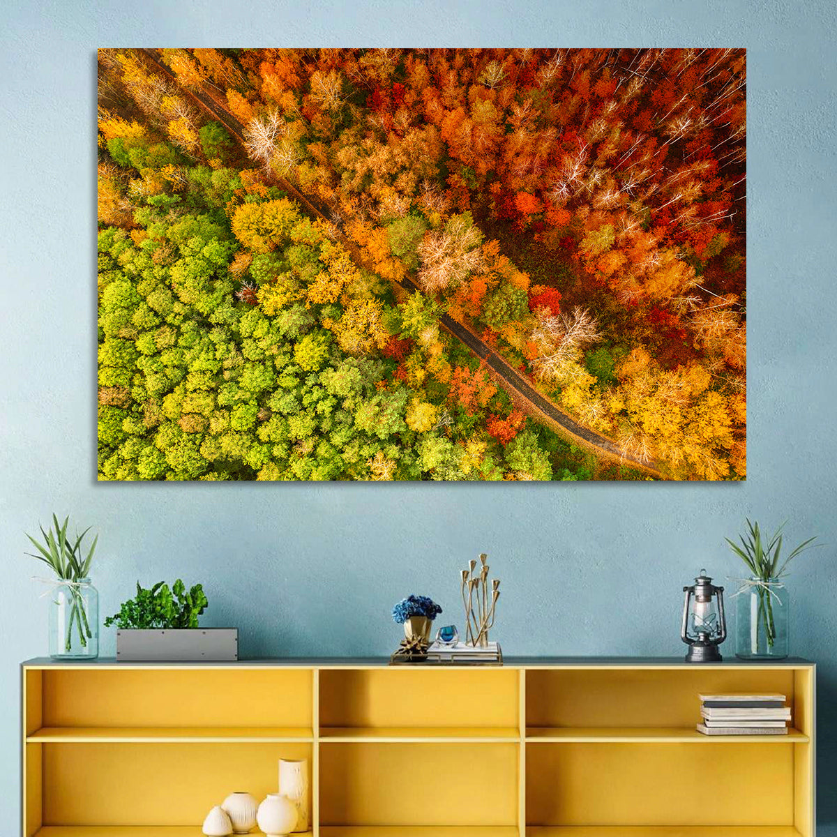 Winding Road Through Autumn Forest Wall Art in a room, landscape