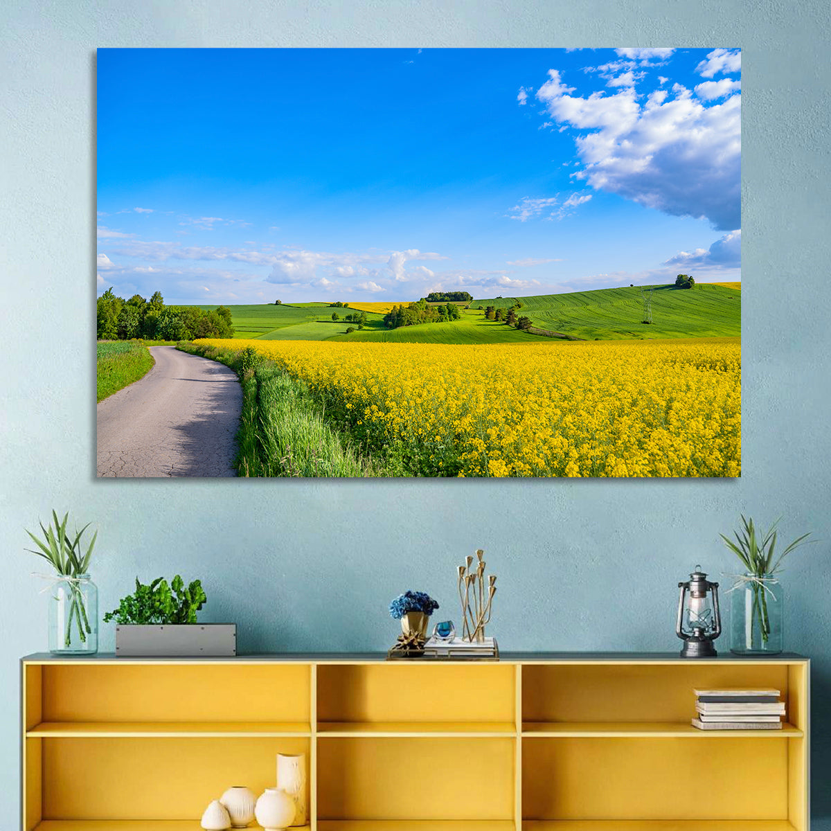 Rapeseed Field Road Under Blue Sky Wall Art in a room, landscape