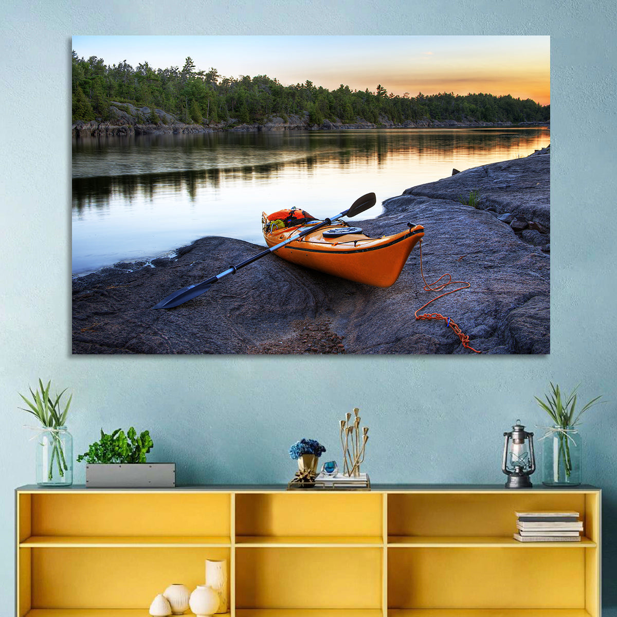 Orange Kayak on Rocky Shore Wall Art in a room, landscape