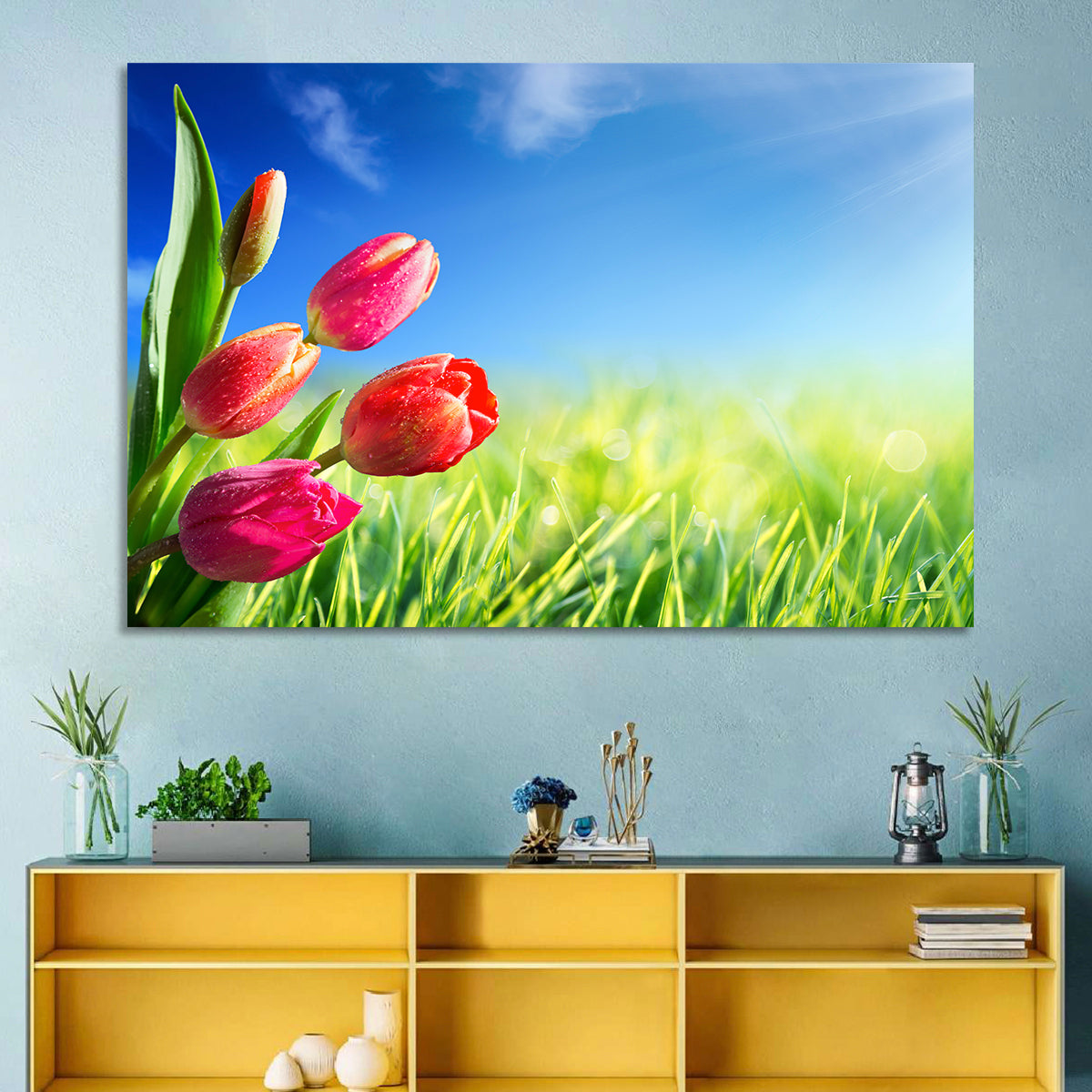 Dewy Red Tulips Under Blue Sky Wall Art in a room, landscape