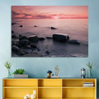 Pink Dusk Lakeshore with Silhouetted Rocks Wall Art