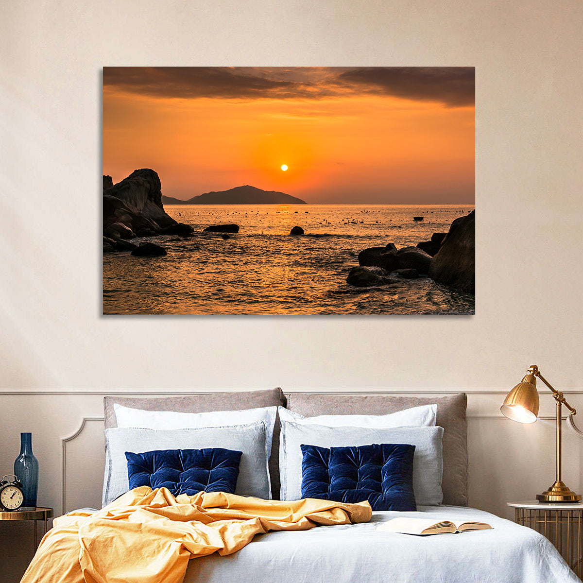 Orange Sunrise Over Rocky Coast Wall Art in a room, landscape