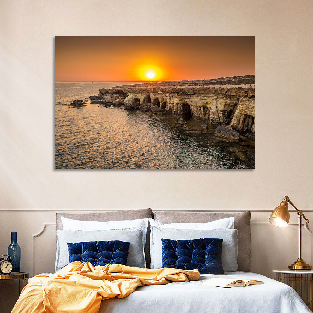 Sunset Over Sea Caves Wall Art in a room, landscape