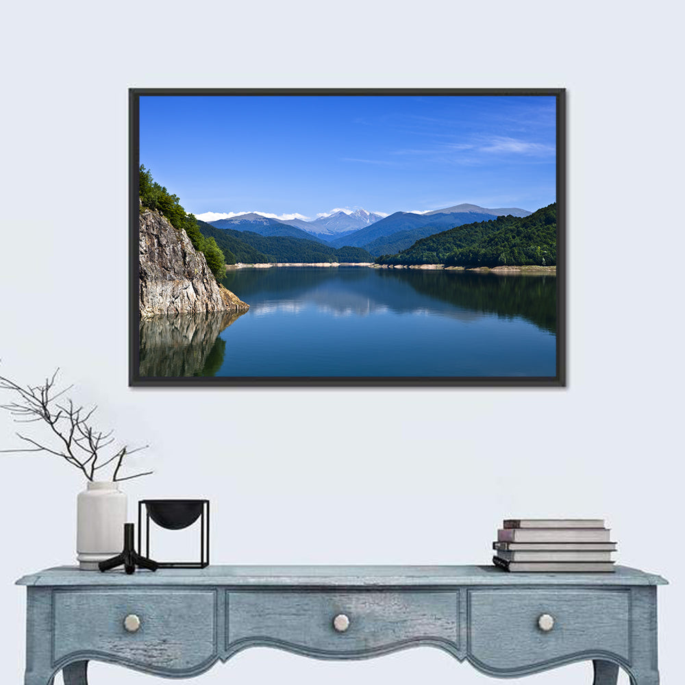Cliffside Mountain Lake Reflection Wall Art in a room, landscape
