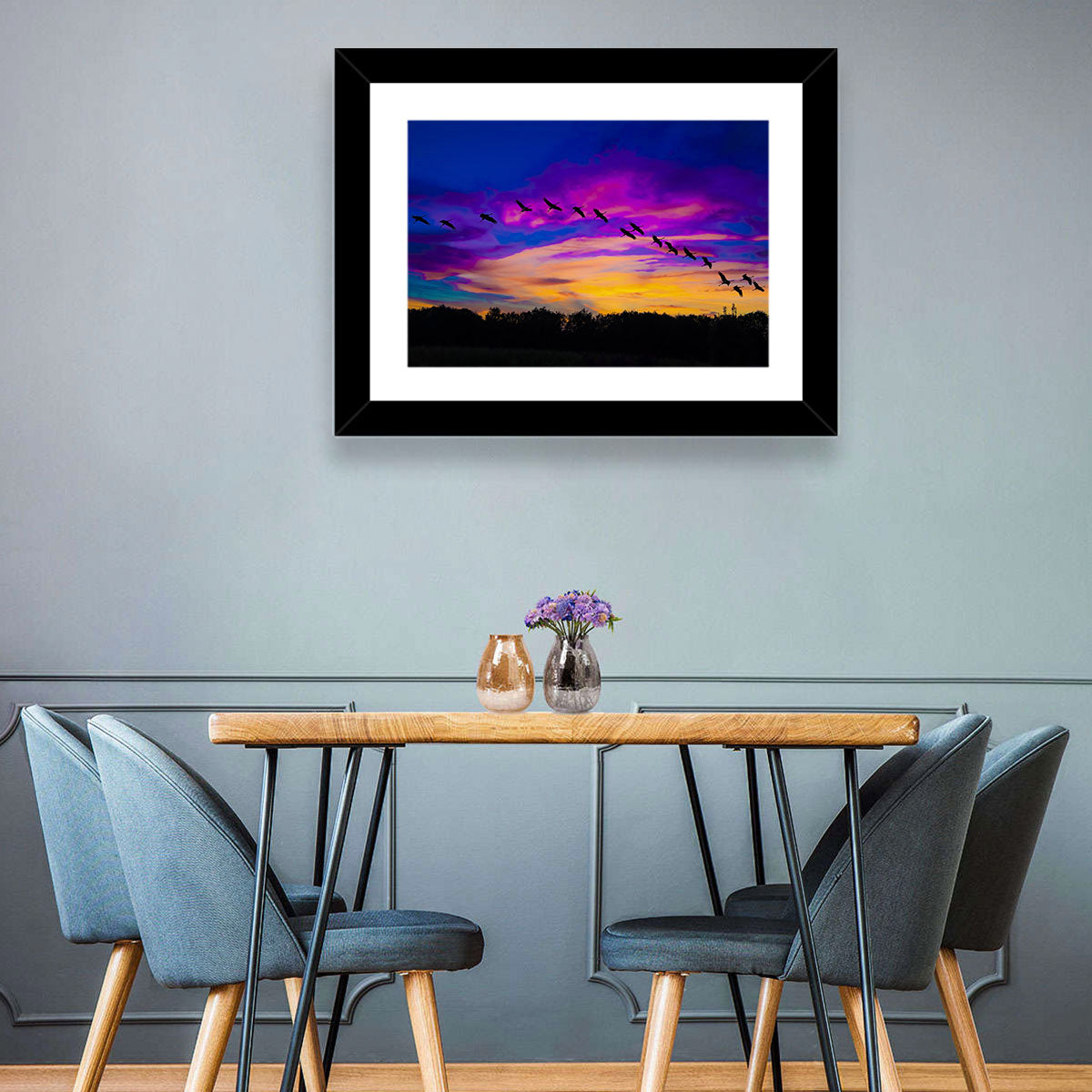 Silhouetted Cranes at Dusk Wall Art in a room, landscape