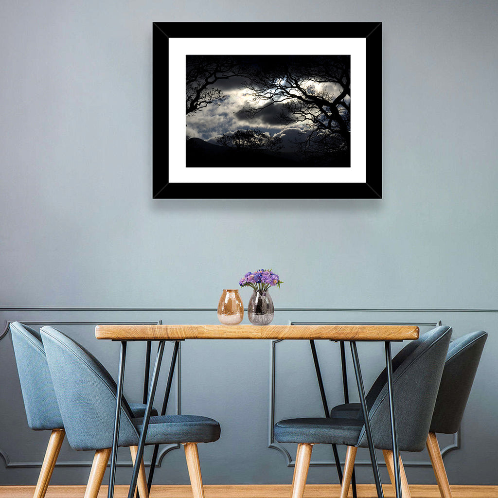 Storm Clouds Over Silhouetted Trees Wall Art