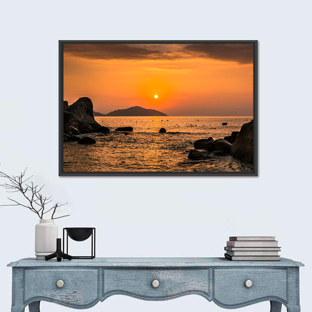 Orange Sunrise Over Rocky Coast Wall Art