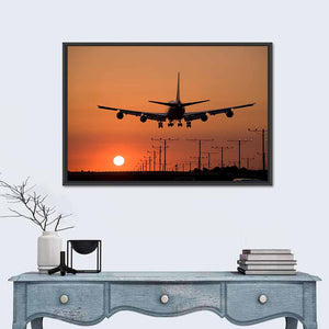 Airplane Landing at Sunset Wall Art